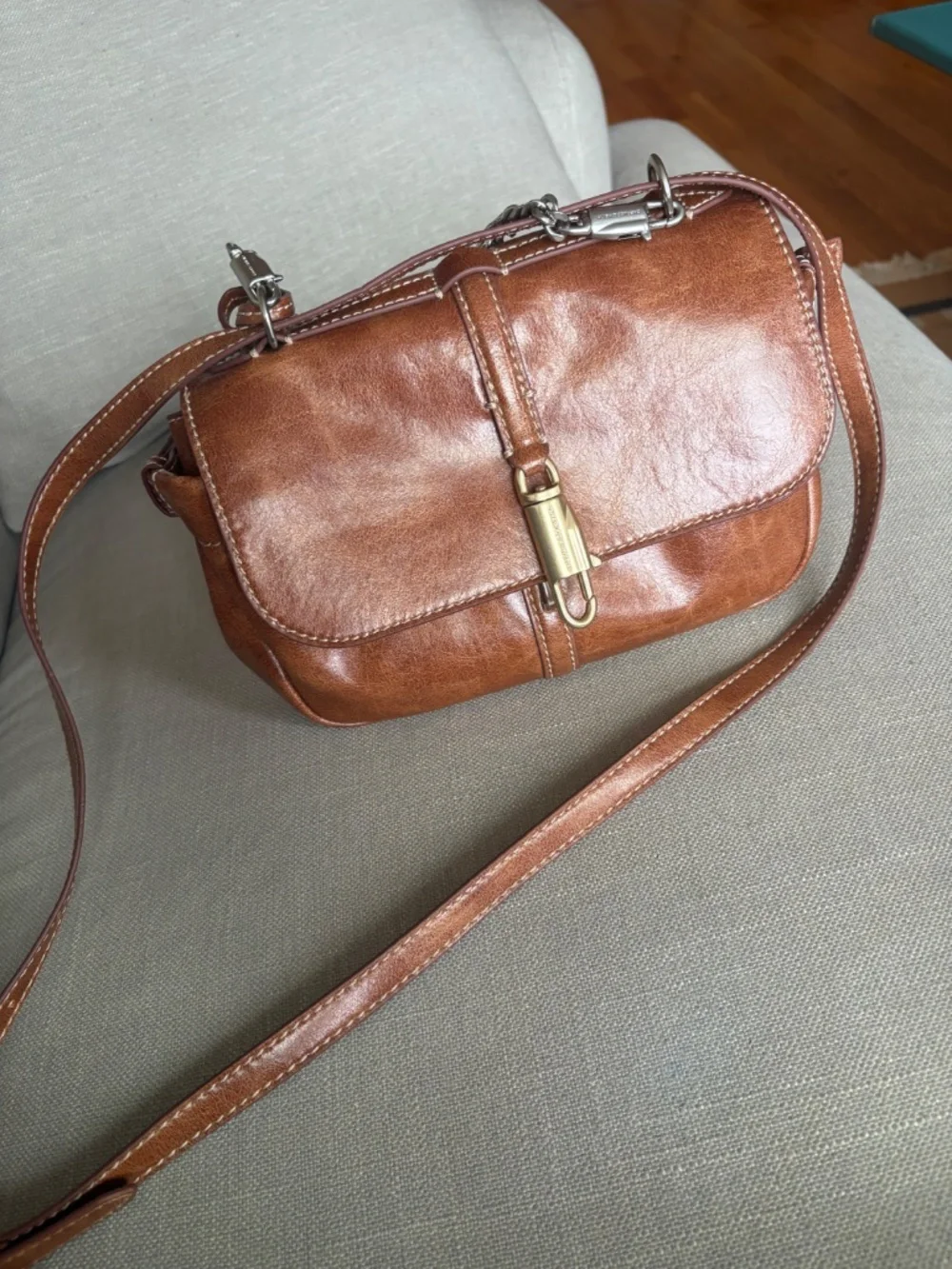 CHARLES & KEITH Delfina Chain Crossbody Bag in Distressed Tan